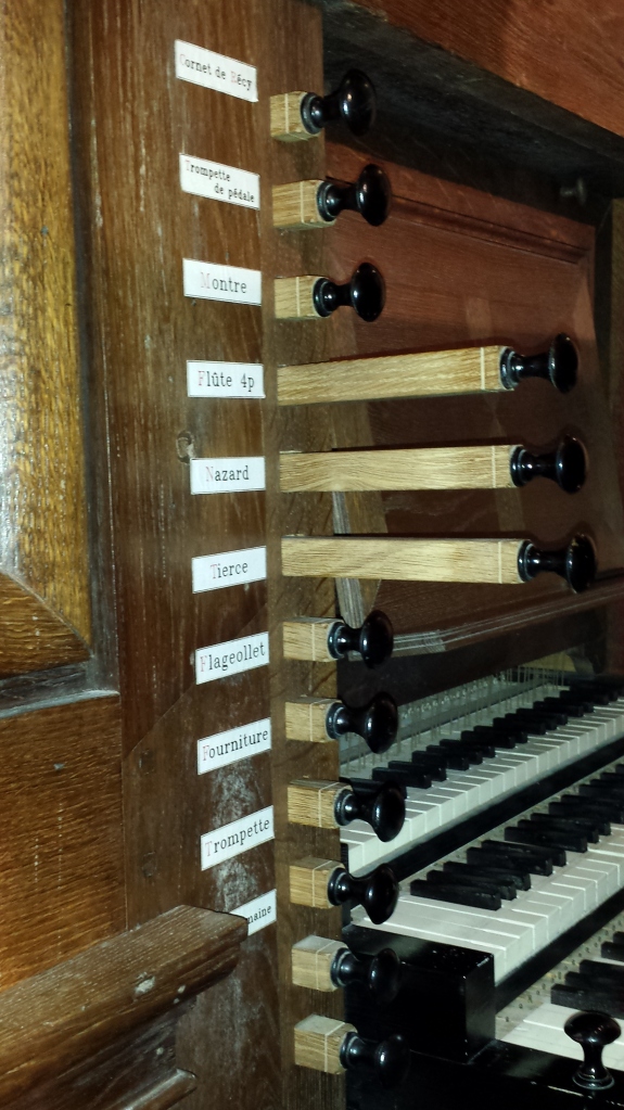 These levers are called stops, so called because they stop the air from passing through to create sound. Welcome to the wonderfully complex world of pipe organs.